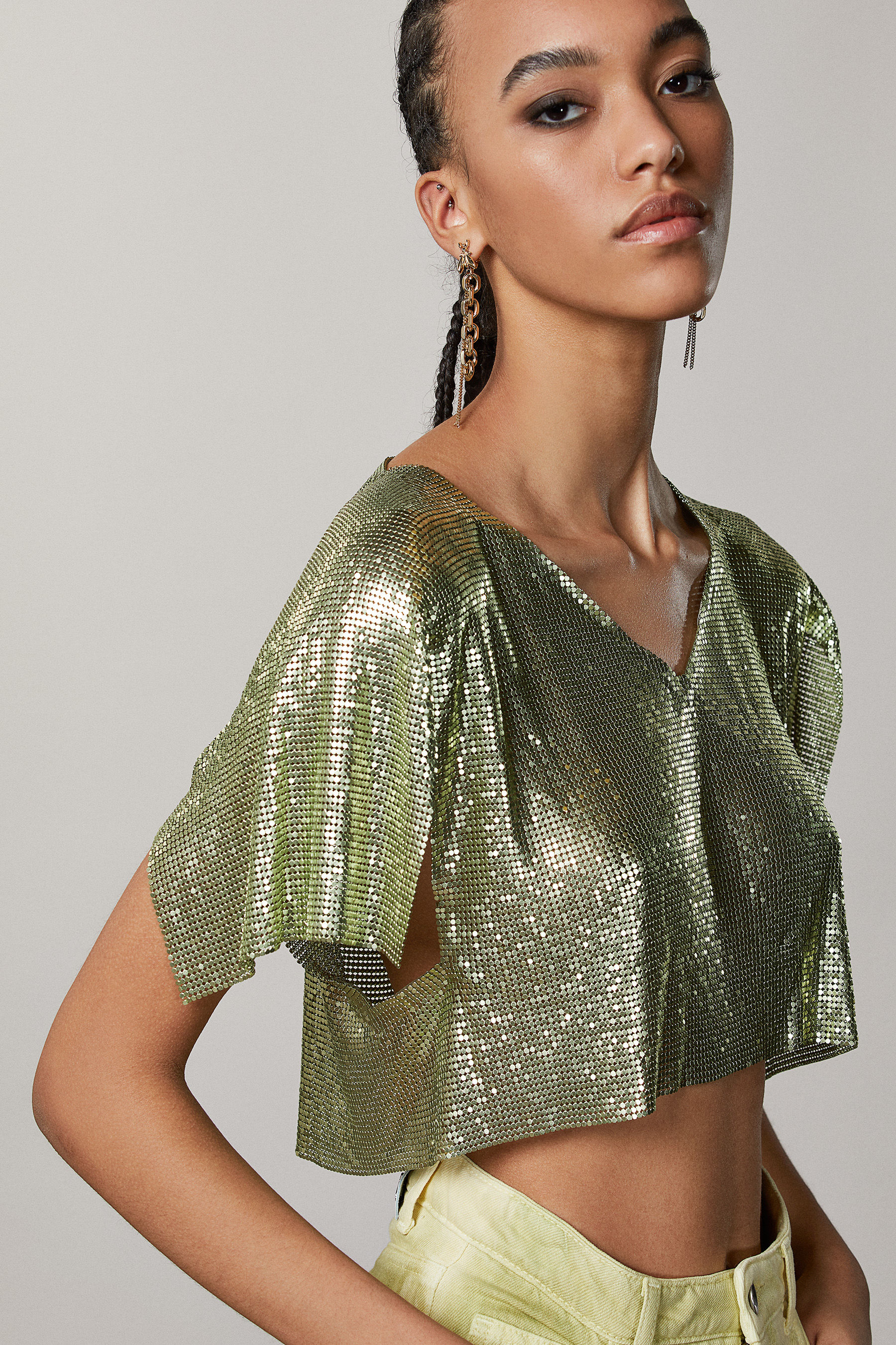 Top senza maniche in maglia metallica