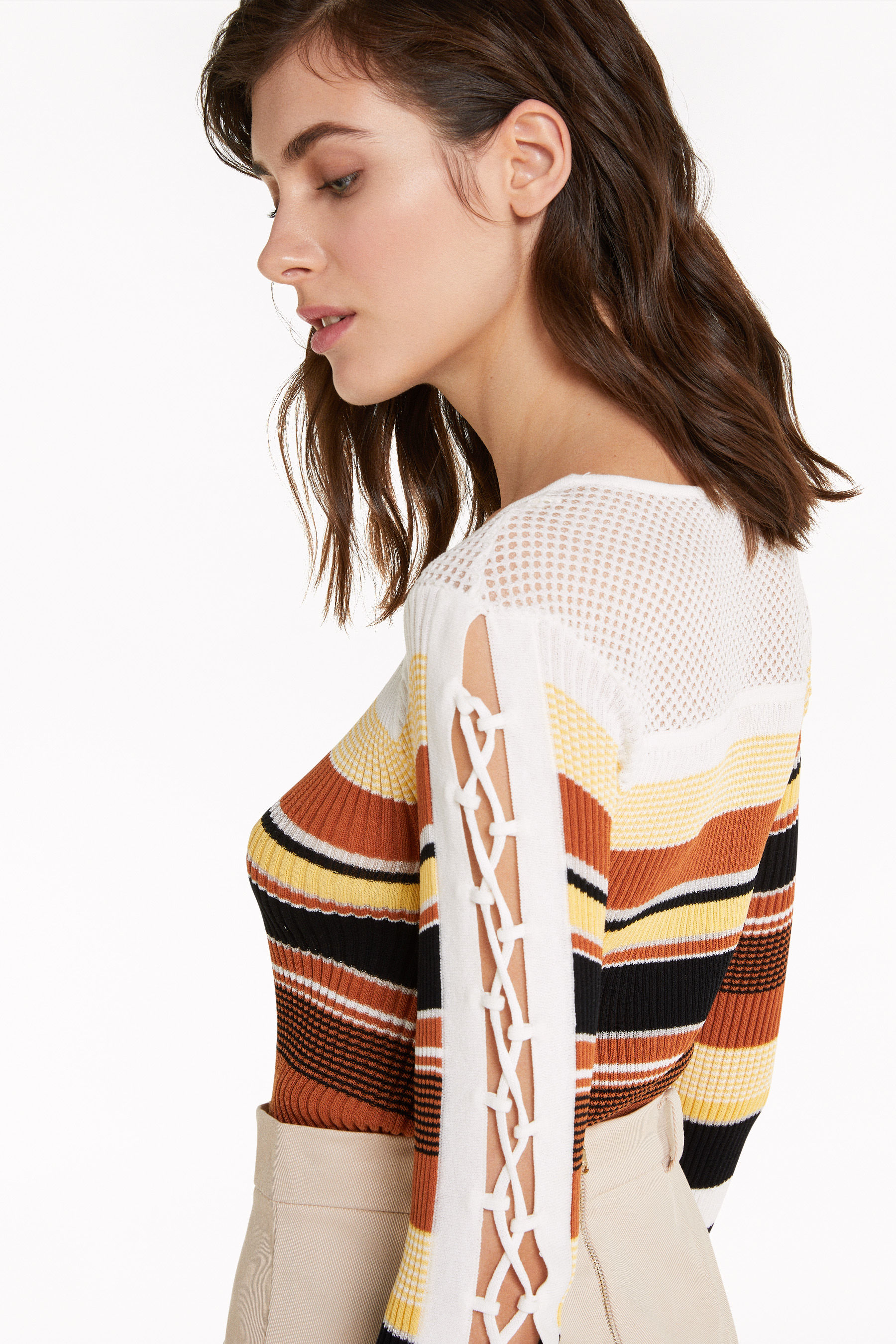 Sweater with woven detail