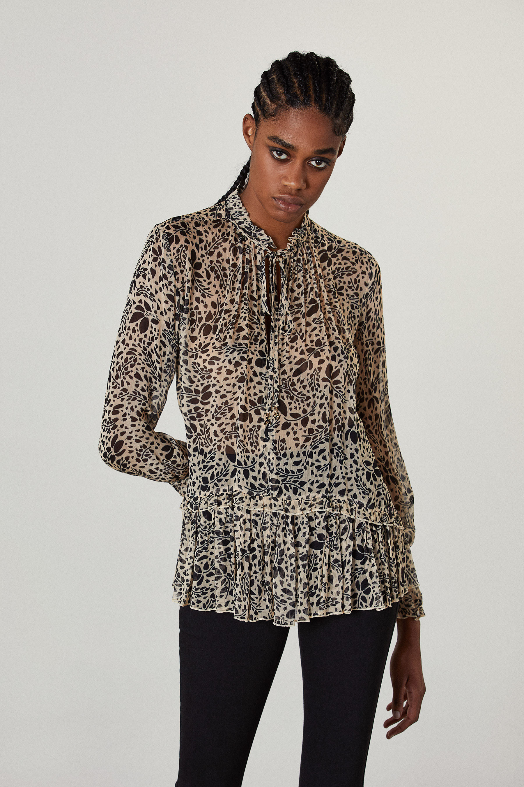 Blusa in viscosa stampata con fiocco