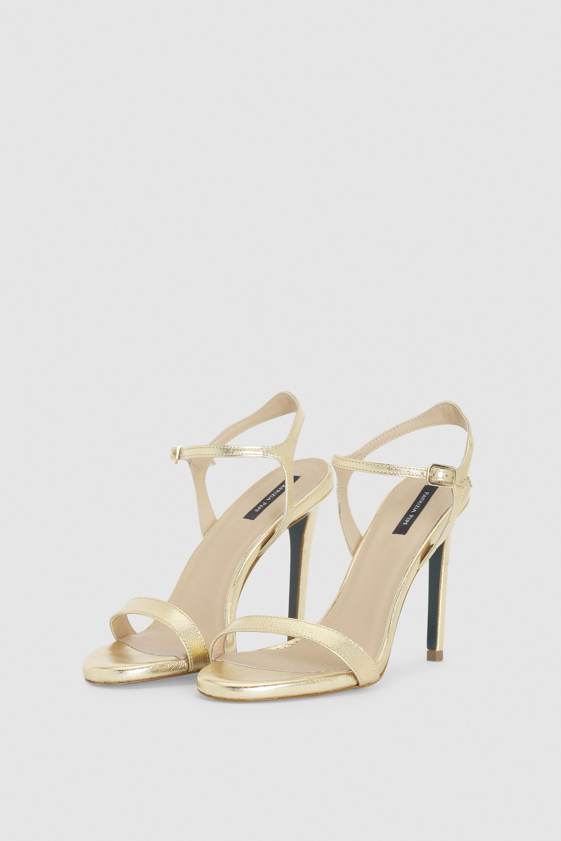 white slip on heeled sandals