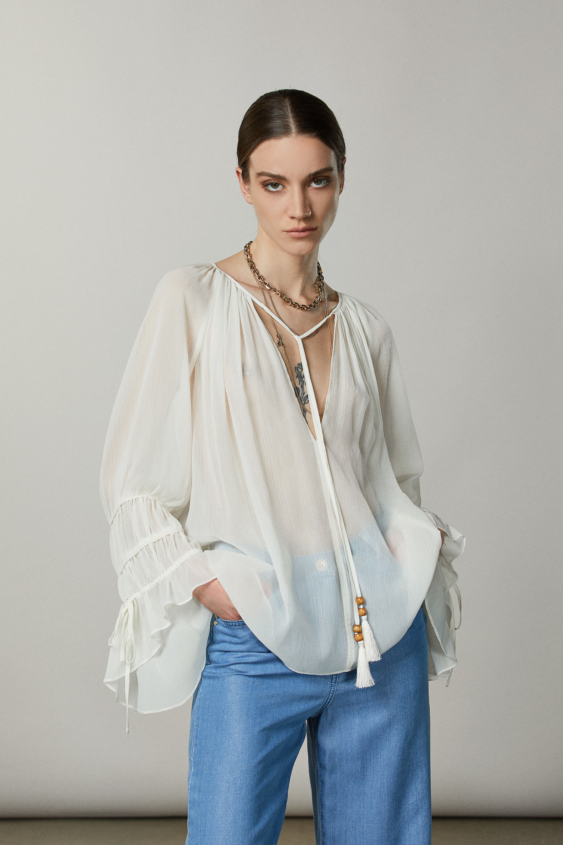 Casacca plissè con fiocco