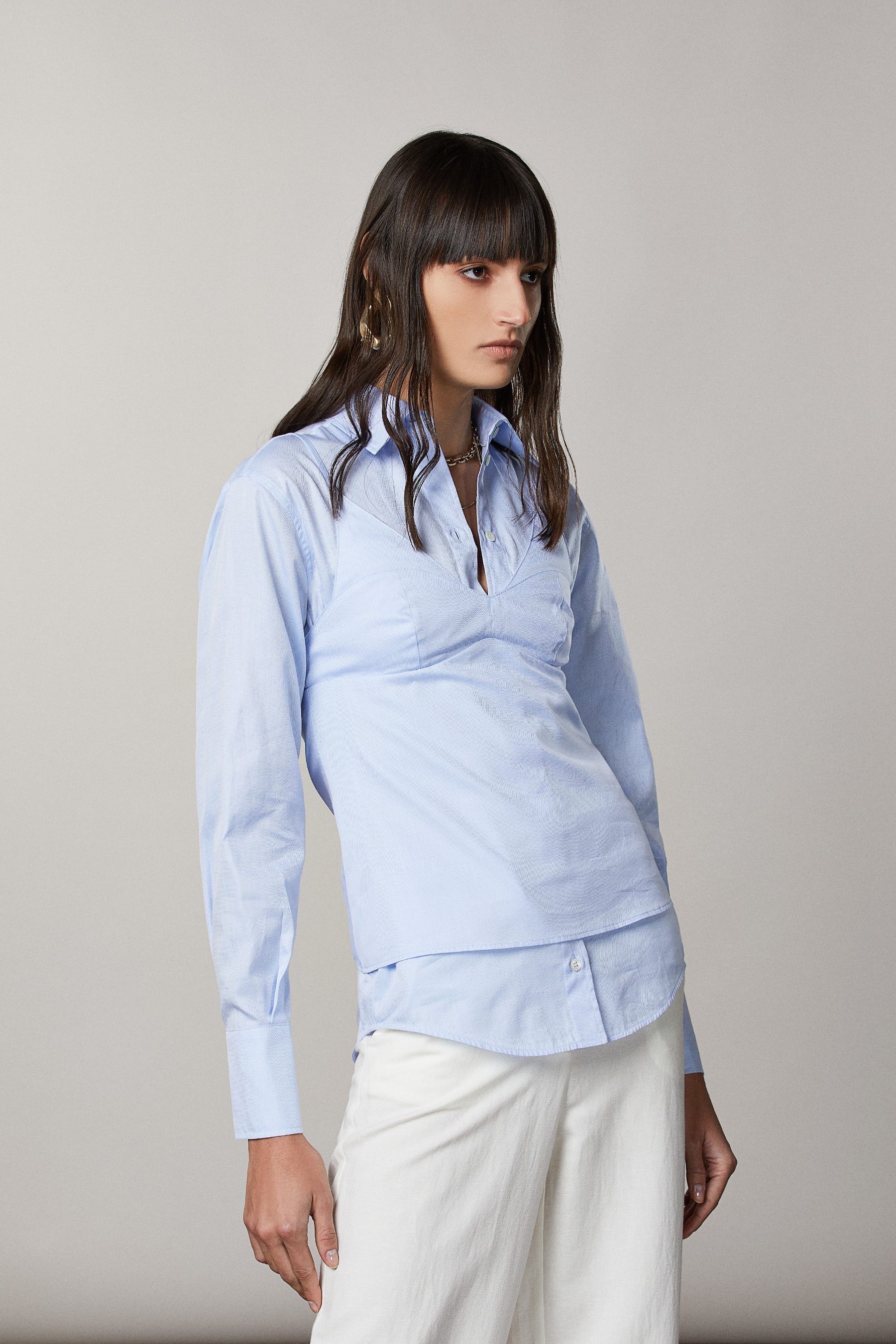 Top con doppia cappa